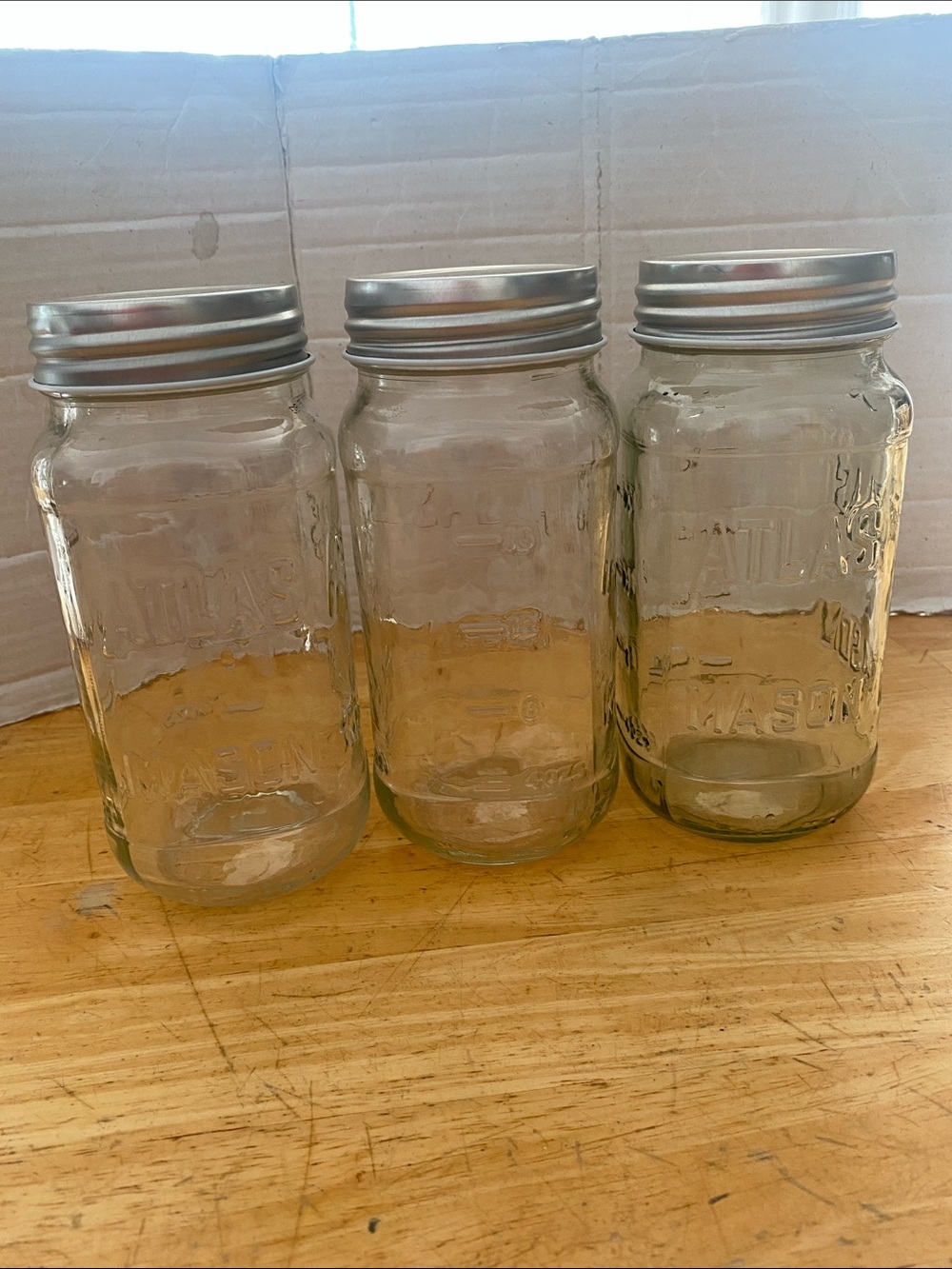 Set of 3 Clear Glass Atlas Mason Jars with Silver Lids. Holds up to 24 oz.